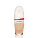 An oval-shaped bottle of Shiseido Revitalessence Skin Glow Foundation SPF 30 in shade 240 Quartz. The label on the bottle is white with a red accent. The text on the label reads the product's title, and its sunscreen protection.