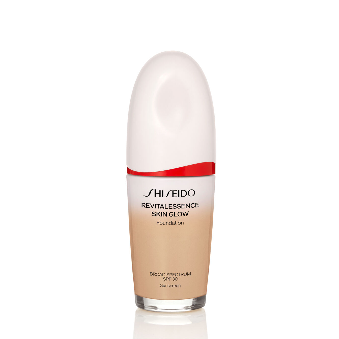 Frasco ovalado de Shiseido Revitalessence Skin Glow Foundation SPF 30 en el tono 260 Cashmere. La etiqueta de la botella es blanca con un detalle en rojo. El texto de la etiqueta indica el nombre del producto y su factor de protección solar.