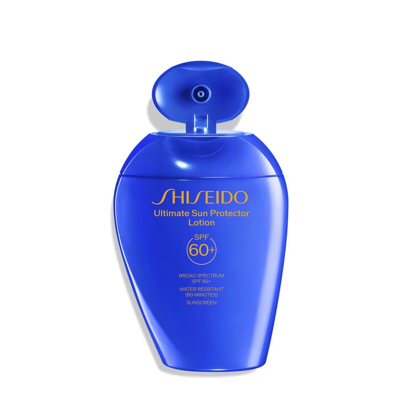 An open blue bottle of Shiseido Ultimate Sun Protector Lotion 150mL, labeled with the Shiseido logo, el nombre del producto,and the SPF level (60+). The label also indicates that the product is broad spectrum and water resistant for up to 80 minutes.