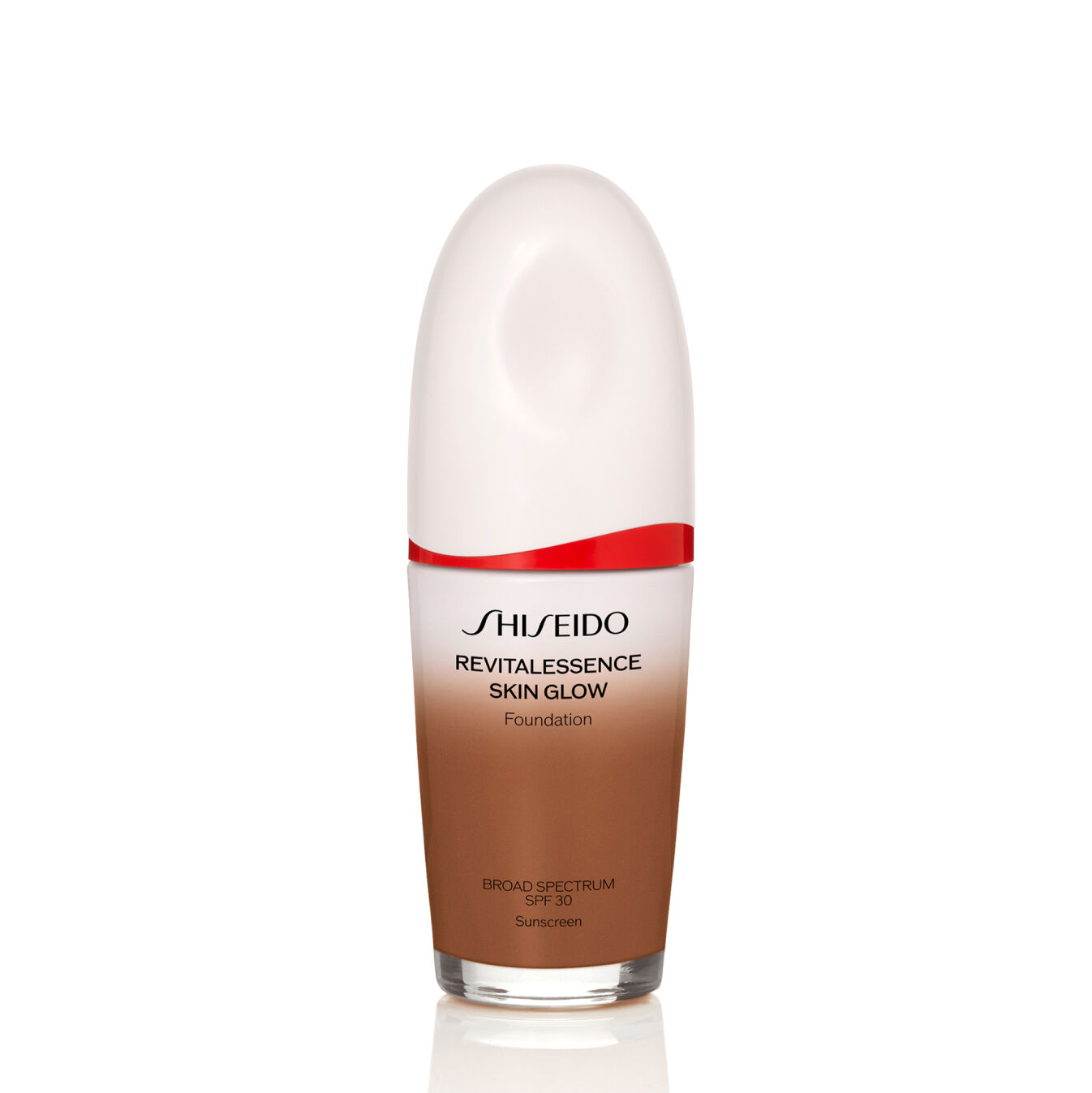 "Frasco ovalado de Shiseido Revitalessence Skin Glow Foundation SPF 30 en el tono 450 Copper. La etiqueta de la botella es blanca con un detalle en rojo. El texto de la etiqueta indica el nombre del producto y su factor de protección solar".