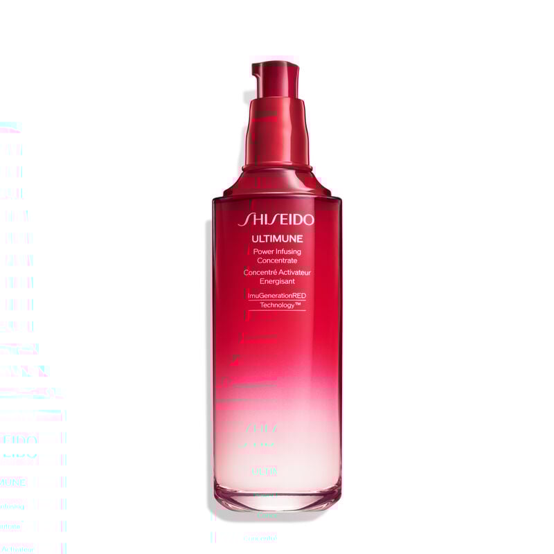 A red, open cylindrical bottle of Shiseido Ultimune Power Infusing Serum, without the cap,revealing the pump dispenser. The text on the bottle says the title in both English and French, and it indicates that the formula contains “ImuGenerationRED Technology.”