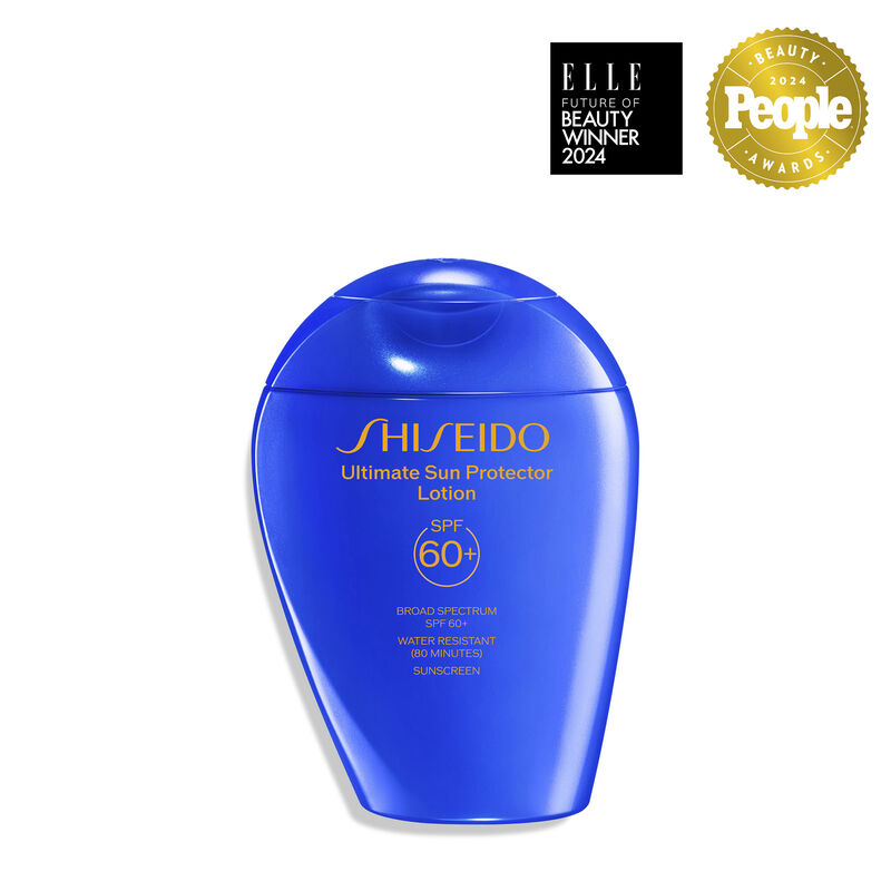 A closed, blue bottle of Shiseido Ultimate Sun Protector Lotion 150mL, labeled with the Shiseido logo, el nombre del producto,and the SPF level (60+). The label also indicates that the product is broad spectrum and water resistant for up to 80 minutes.