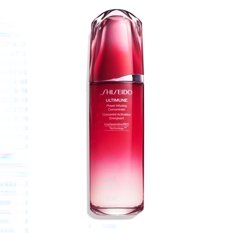A red, cylindrical bottle of Shiseido Ultimune Power Infusing Serum. The text on the bottle says the title in both English and French, and it indicates that the formula contains “ImuGenerationRED Technology.”