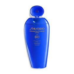A closed, blue bottle of Shiseido Ultimate Sun Protector Lotion 300mL, labeled with the Shiseido logo, product name,and the SPF level (60+). The label also indicates that the product is broad spectrum and water resistant for up to 80 minutes.